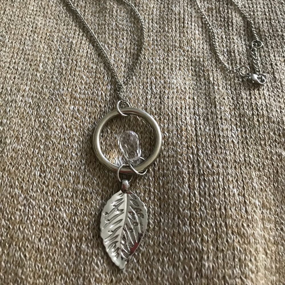 Silver tone feather necklace
